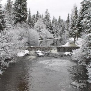 Traprock River Dam covered in snow