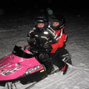Jr Sled Chicks Hollywood and Kenzie carving the deep powder with the 120