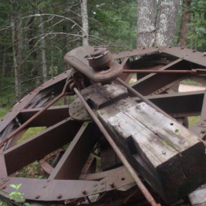 126  I stumbled across this old wheel in Manistee National Forest and really would like to know what it is?
