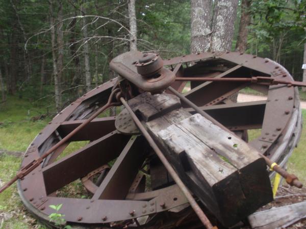 126  I stumbled across this old wheel in Manistee National Forest and really would like to know what it is?