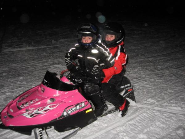 Jr Sled Chicks Hollywood and Kenzie carving the deep powder with the 120