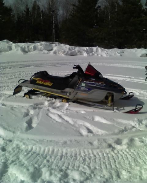 my sled in the parking lot in clam lake